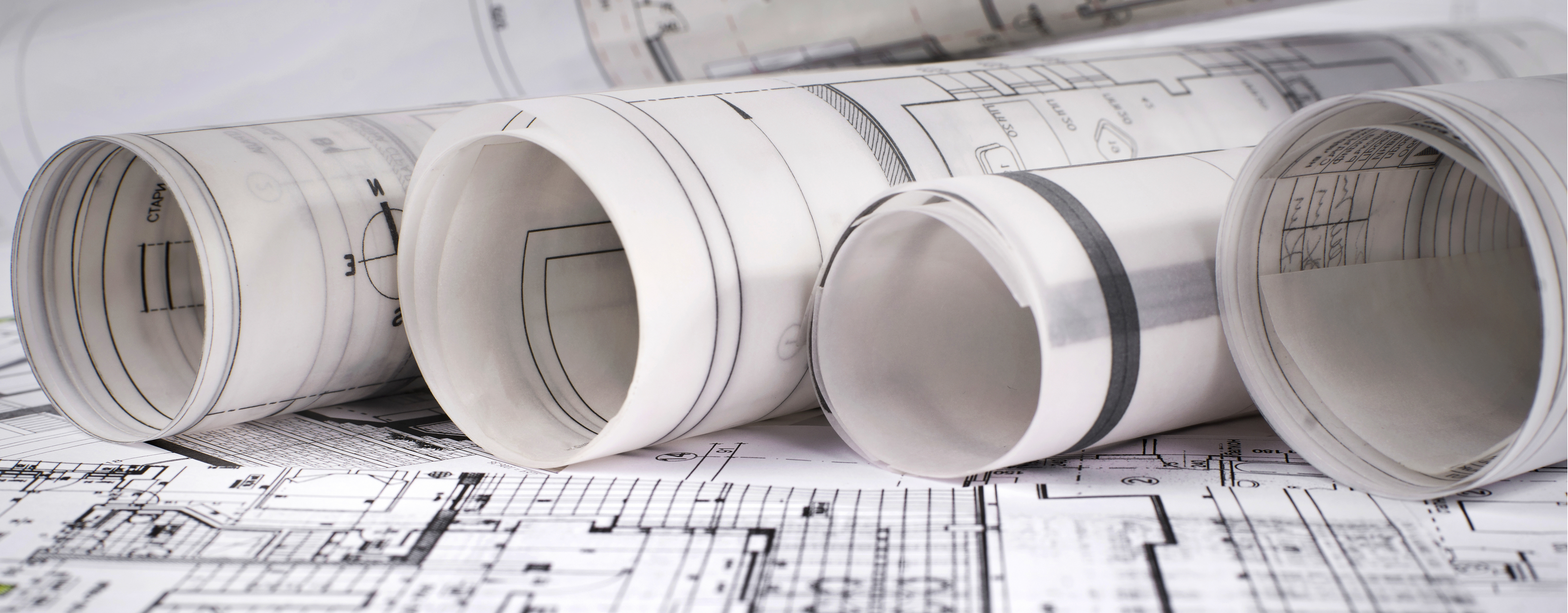 Rolled up building plans.